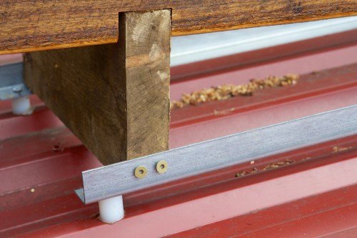 The sled is anchored to a metal rail, screwed into the roof.