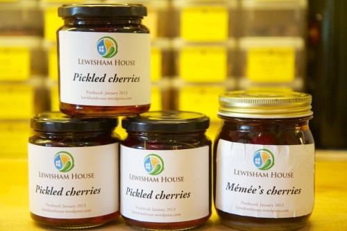 Jars of home-made pickled and brandied cherries.