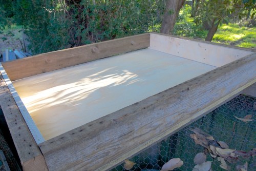 The sides of the green roof go on.