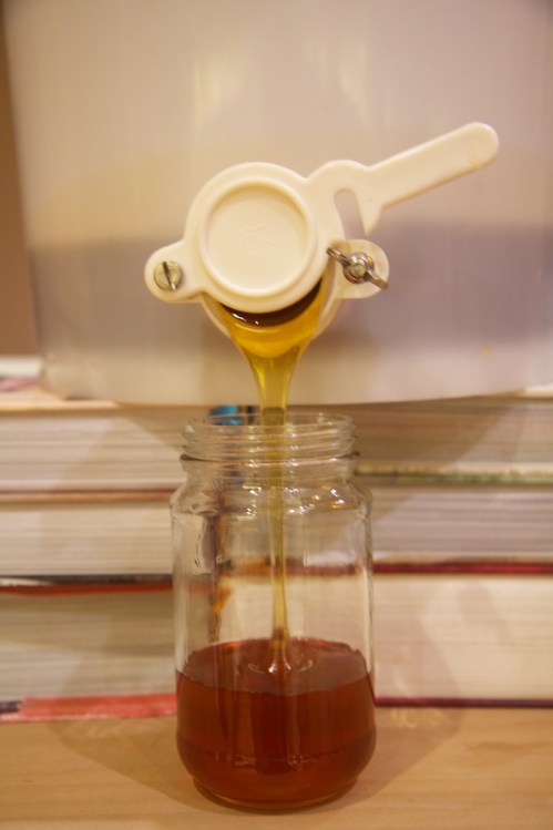 Pouring the honey into jars :-)