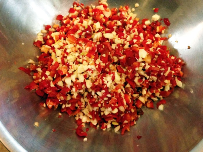 Finely chopped, ready to be crushed by hand (wearing gloves!).