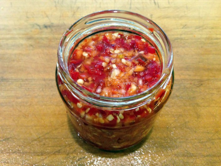 One jar of chilli and garlic, ready to be fermented for a full month.