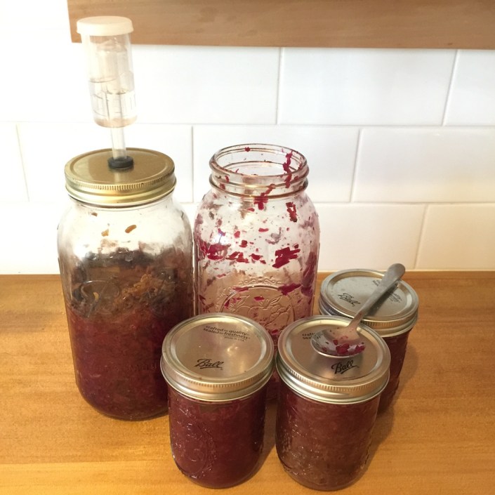 Packing jars full of delicious beet-kraut