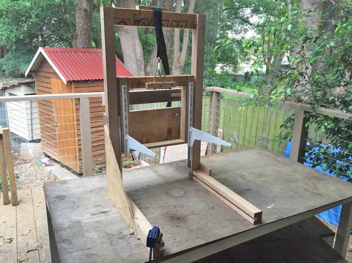 The hive lifter from the front, showing the two lifting arms made from shelving brackets